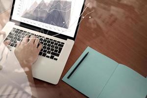 top view of Double exposure of businessman hand working with new modern computer and business strategy as concept photo