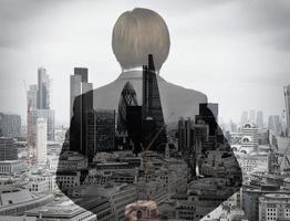 double exposure of back view of success businessman looking at london building as concept