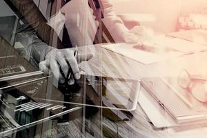 Double exposure of Website designer holding smart phone and working computer digital tablet on wood table,London architecture buldings photo