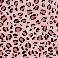 manchas de leopardo patrón sin costuras sobre fondo rosa. estampado animal amarillo-naranja. tendencias punto negro. fauna silvestre. estampado textil. vector