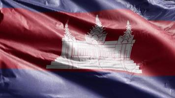 Cambodia textile flag slow waving on the wind loop. Cambodian banner swaying on the breeze. Fabric textile tissue. Full filling background. 20 seconds loop. video