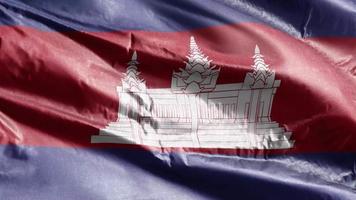 bandeira têxtil do camboja acenando no loop de vento. bandeira cambojana balançando na brisa. tecido tecido têxtil. fundo de preenchimento completo. loop de 10 segundos. video