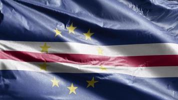 bandeira têxtil de cabo verde acenando lentamente no loop de vento. bandeira de cabo verde balançando suavemente na brisa. tecido tecido têxtil. fundo de preenchimento completo. Ciclo de 20 segundos. video