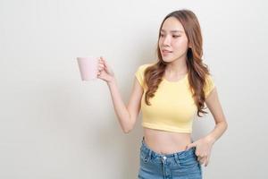 portrait beautiful Asian woman holding coffee cup or mug photo