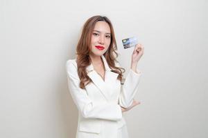 portrait beautiful Asian woman holding credit card photo