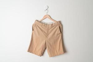 short pants hanging on wall photo