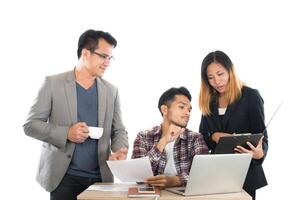 Portrait of business partners discussing documents and ideas at meeting in office isolated on white background. photo