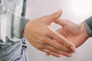 Business partnership meeting concept.photo businessmans handshake. Successful businessmen handshaking after perfect deal.close up,filter photo