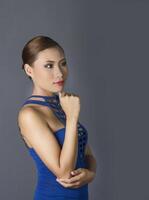 Sexy woman standing woman wearing blue clothes photo