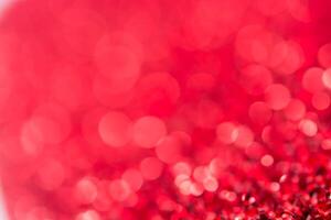 Red bokeh holiday textured Christmas decorations background photo