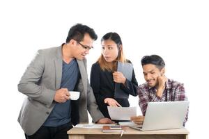 Portrait of business partners discussing documents and ideas at meeting in office isolated on white background. photo