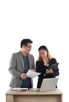 Young business woman standing with her boss conversation about the business at office isolated on white background. photo