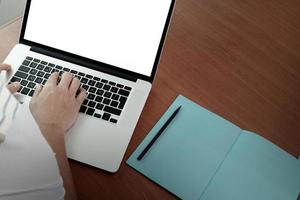 top view of Double exposure of businessman hand working with new modern computer and business strategy as concept photo