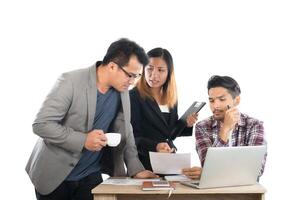 Portrait of business partners discussing documents and ideas at meeting in office isolated on white background. photo