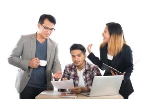 Portrait of business partners discussing documents and ideas at meeting in office isolated on white background. photo