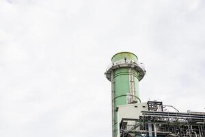 view of pipelines and towers, heavy industry. photo