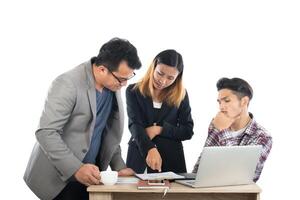 Portrait of business partners discussing documents and ideas at meeting in office isolated on white background. photo