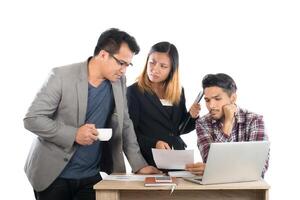 Portrait of business partners discussing documents and ideas at meeting in office isolated on white background. photo