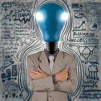 businessman with blue light bulb head