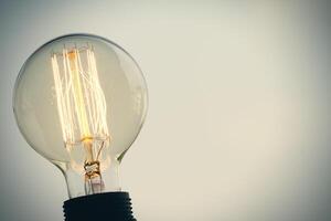 close up of vintage light bulb as creative concept photo