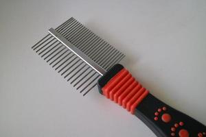comb for combing dog or cat hair photo
