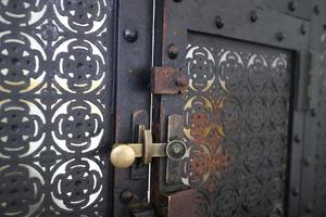 simple lock on scrap metal window photo