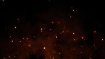 Schuss von fliegenden Feuerfunken in der Luft auf dunkelschwarzem Hintergrund