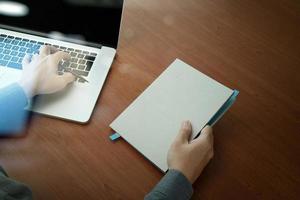 top view of Double exposure of businessman hand working with new modern computer and business strategy as concept photo