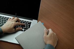 top view of Double exposure of businessman hand working with new modern computer and business strategy as concept photo