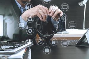 Man using VOIP headset with digital tablet computer as concept communication or it support or call center and customer service in modern office photo