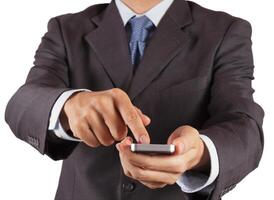 businessman hand using touch screen mobile photo