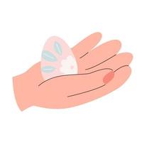 Hand hold easter egg on white background vector