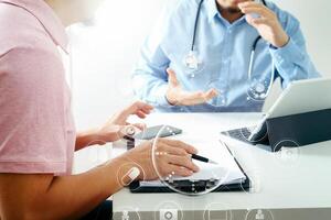 Medical doctor using mobile phone and consulting businessman patient having exam as Hospital professionalism concept photo