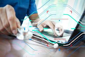 Doctor working with laptop computer in medical workspace office as concept photo