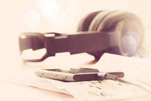 composing music concept with shallow DOF evenly matched jack of headphone and copy space photo