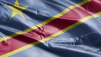 Democratic Republic of the Congo flag waving on the wind loop. Democratic Republic of the Congo banner swaying on the breeze. Full filling background. 10 seconds loop. video