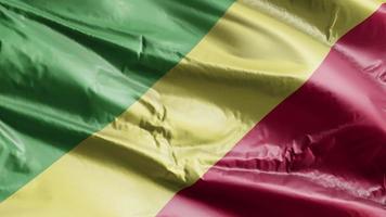 flagge der republik kongo weht auf der windschleife. Banner der Republik Kongo wiegt sich im Wind. voll ausfüllender Hintergrund. 10 Sekunden Schleife. video