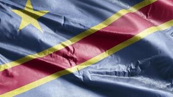 Democratic Republic of the Congo textile flag waving on the wind loop. Democratic Republic of the Congo banner swaying on the breeze. Fabric textile tissue. Full filling background. 10 seconds loop. video