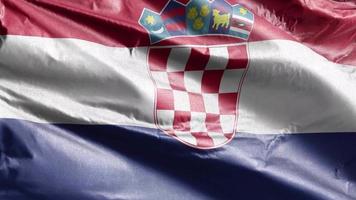 Croatia textile flag slow waving on the wind loop. Croatian banner smoothly swaying on the breeze. Fabric textile tissue. Full filling background. 20 seconds loop. video