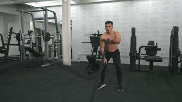 young finess man exercise at fitness video