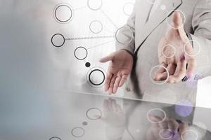 businessman hand showing blank flow chart on new modern computer as concept with bokeh exposure photo