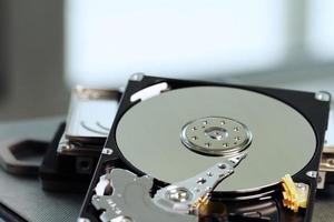 Close up of open computer hard disk drive on notebook