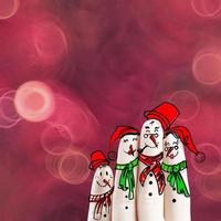 A lovely family hand drawn and finger of snowmen on flowers nature background as concept idea photo