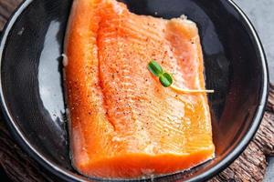 salmon raw fish fresh seafood second course dietary healthy pescatarian diet photo