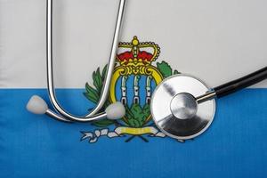 San Marino flag and stethoscope. The concept of medicine. photo