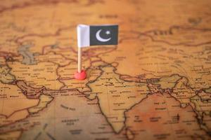 The flag of Pakistan on the world map. photo