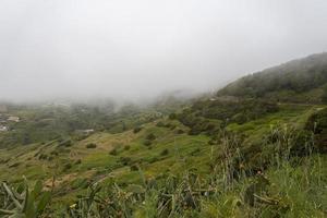 Clouds over the mountains on the island of Tenerife. photo