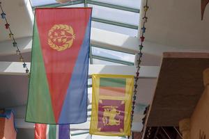 The Eritrean flag weighs on the inside of the roof. photo