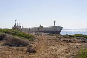 Abandoned ship that was shipwrecked off near the coast of Cyprus photo