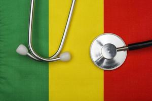 Flag of Mali and stethoscope. The concept of medicine. photo
